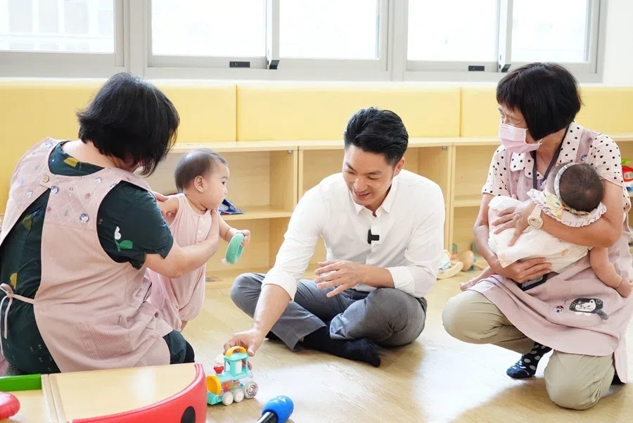 Taipei mayor Chiang Wan-an visiting a childcare facility in Wenshan district, August 2026.