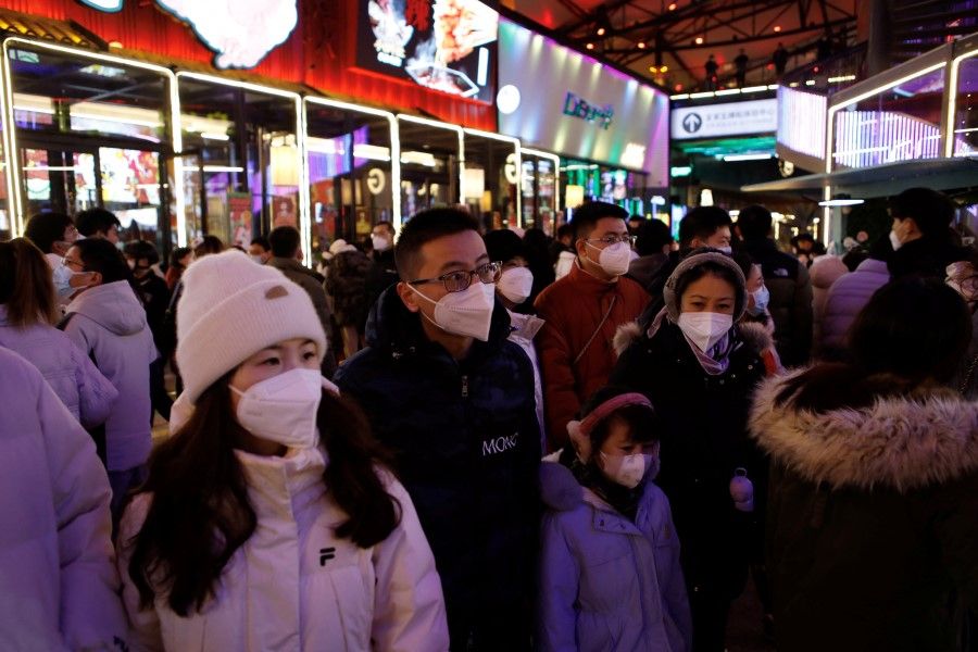 Visitors throng a shopping complex on New Year's Eve, amid the coronavirus disease (Covid-19) outbreak in Beijing, China, 31 December 2022. (Florence Lo/Reuters)
