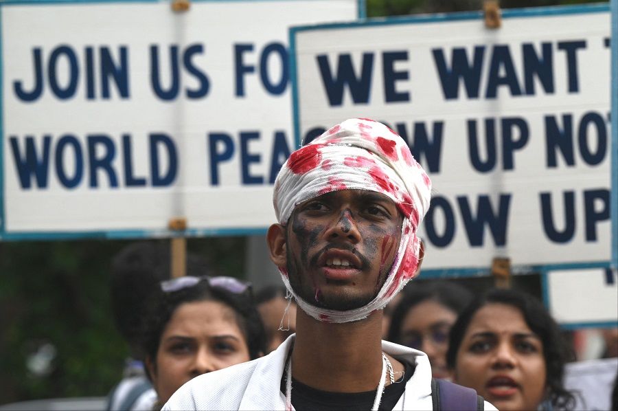 A man dressed as a survivor of the nuclear bomb explosion participates in peace rally to mark the 78th anniversary of the atomic bombing of Hiroshima and Nagasaki at the end of WWII, in Mumbai, India, on 5 August 2023. (Indranil Mukherjee/AFP)