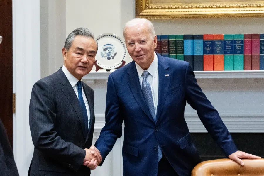 US President Joe Biden (right) with Chinese Foreign Minister Wang Yi (left) at the White House in Washington, DC, on 27 October 2023. (CNS)