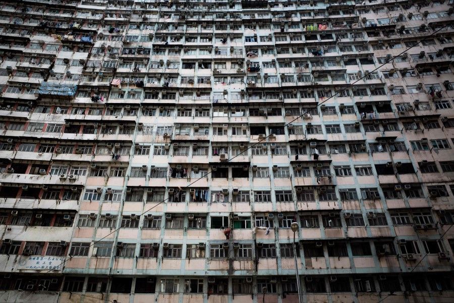 A general view shows residential buildings in Hong Kong on 21 August 2021 (Bertha Wang/AFP)