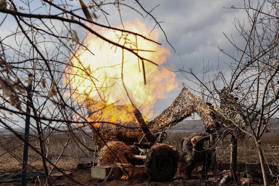 A Ukrainian soldier of the 10th Separate Mountain Assault Brigade "Edelweiss" fires a French MO-120-RT61 mortar towards Russian positions at a front line in the Donetsk region, Ukraine, on 4 March 2023, amid the Russian invasion of Ukraine. (Anatolii Stepanov/AFP)