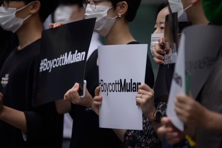 Protesters attend a rally against the release of the Disney movie Mulan outside the company's office in Gangnam, in solidarity with Hong Kong's pro-democracy protests, in Seoul on July 1, 2020. (Ed Jones/AFP)