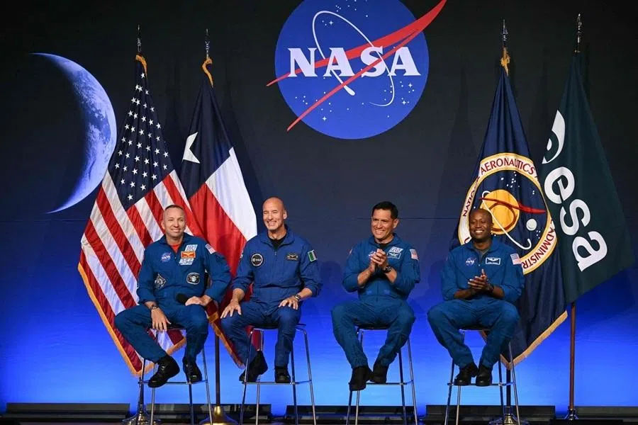 From left to right, NASA astronaut commander Randy Bresnik, ESA (European Space Agency) astronaut pilot Luca Parmitano, NASA astronaut mission specialist Frank Rubio and NASA astronaut mission specialist Andre Douglas speak during a press conference announcing the crew for the Artemis III mission at NASA's Johnson Space Center in Houston, Texas, on 9 June 2026.