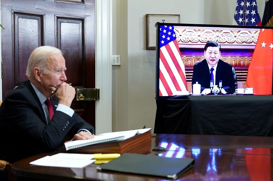 In this file photo taken on 15 November 2021, US President Joe Biden meets with Chinese President Xi Jinping during a virtual summit from the Roosevelt Room of the White House in Washington, DC, US. (Mandel Ngan/AFP)
