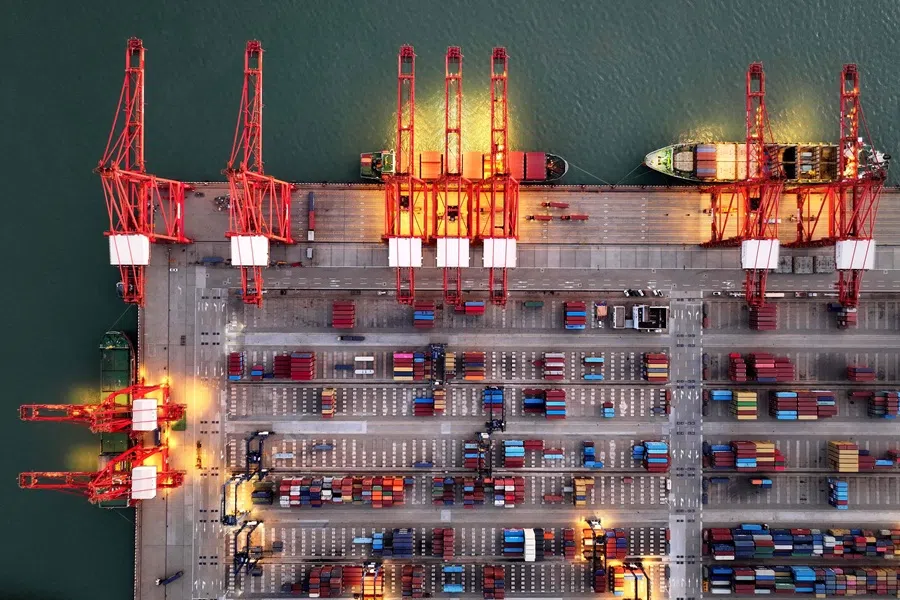 Container ships are seen at the container terminal at Lianyungang port, Jiangsu province, China, on 24 July 2025. (AFP)