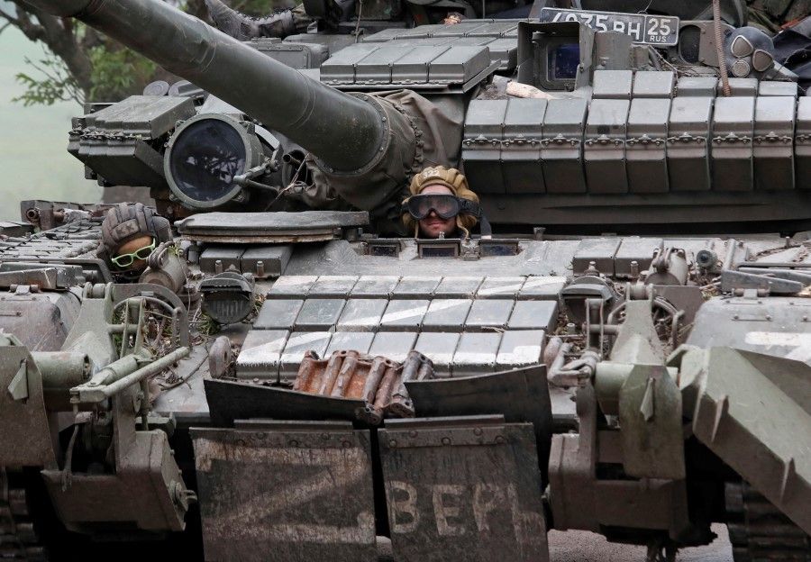 A service member of pro-Russian troops drives a tank during the Russia-Ukraine conflict in the Donetsk Region, Ukraine, 22 May 2022. (Alexander Ermochenko/Reuters)