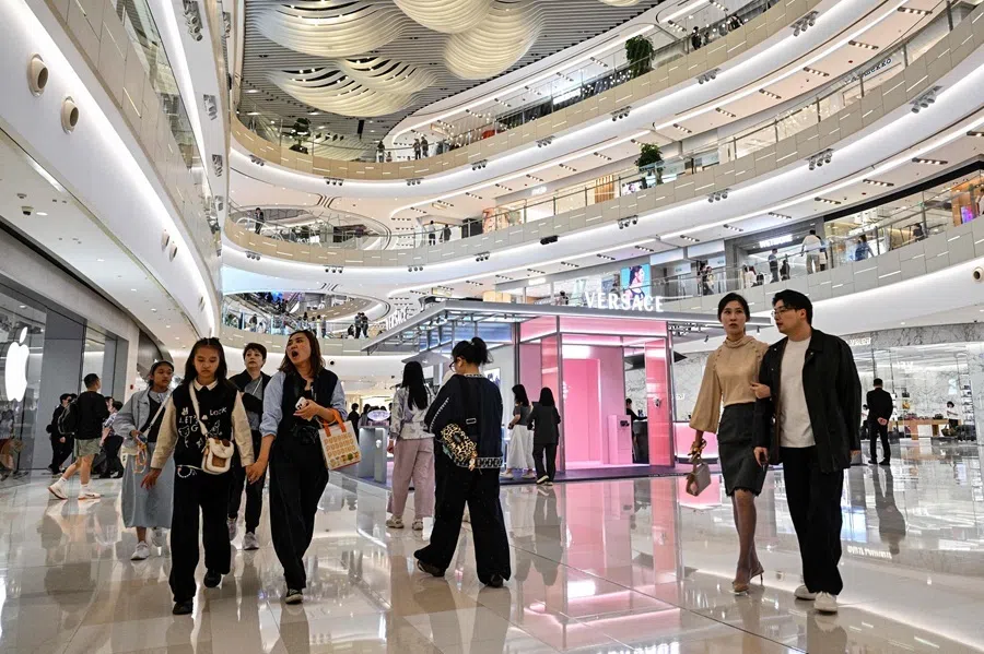 People visit the IAPM shopping mall in Shanghai's Xuhui district on 5 October 2026.