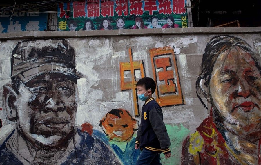 A mural along a street in Wuhan, April 24, 2020. (STR/AFP)