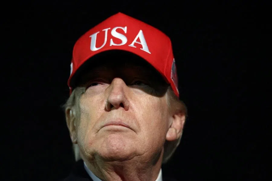 US President Donald Trump looks on after disembarking Air Force One as he arrives at Joint Base Andrews in Maryland, US, on 12 April 2026.