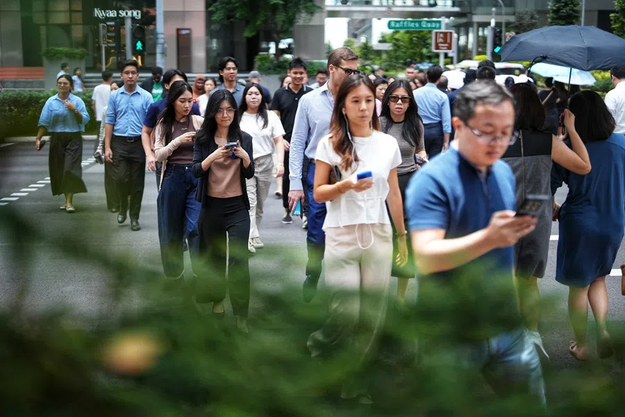People walking around the central business district in Singapore, September 2025. (SPH Media)