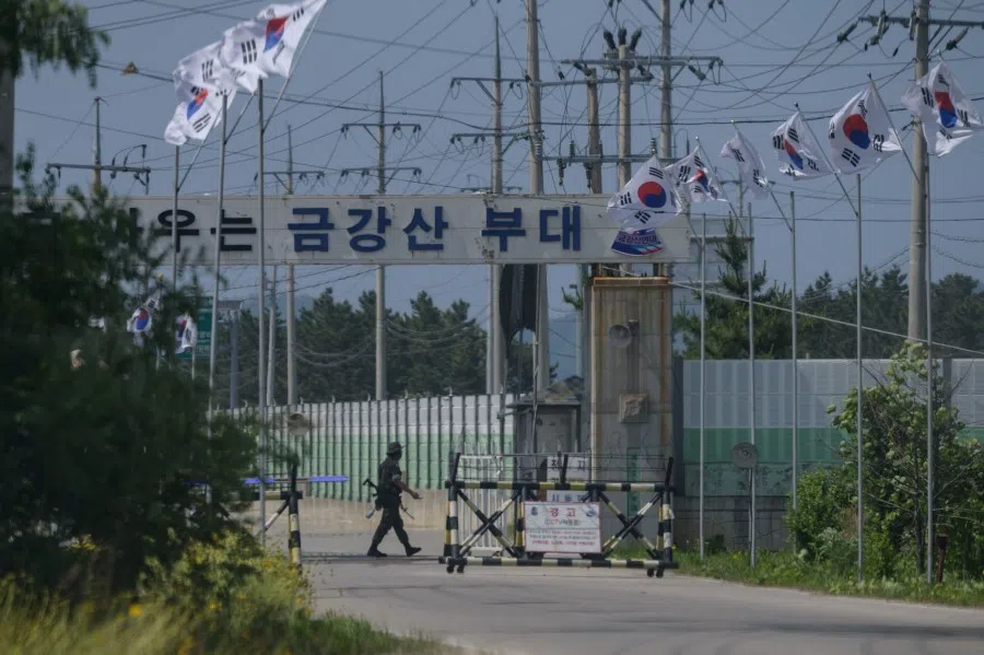 A South Korean soldier guards the entrance to the camp Kumgang Mountain military base near the border area of Goseong on South Korea's northeast coast on 17 June 2020. (Ed Jones/AFP)