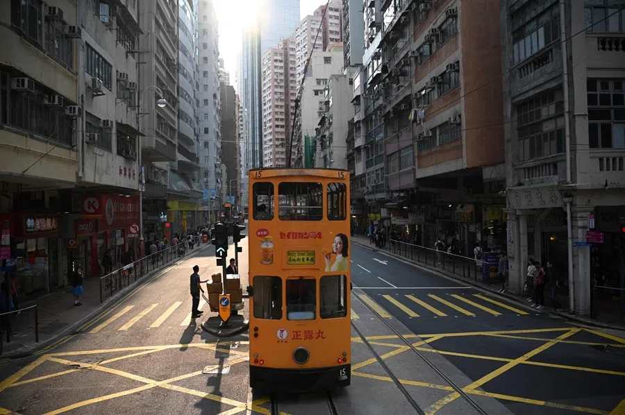 A tram makes its way through Sheung Wan district of Hong Kong on 10 April 2025. (Peter Parks/AFP)