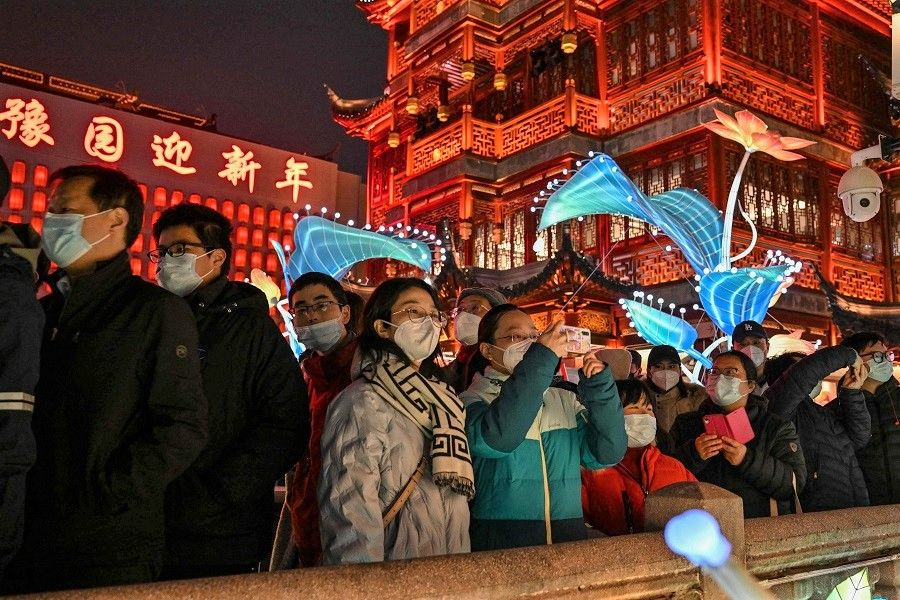 People visit Yu Garden ahead of the Lunar New Year of the Rabbit, in Shanghai, China, on 9 January 2023. (Hector Retamal/AFP)