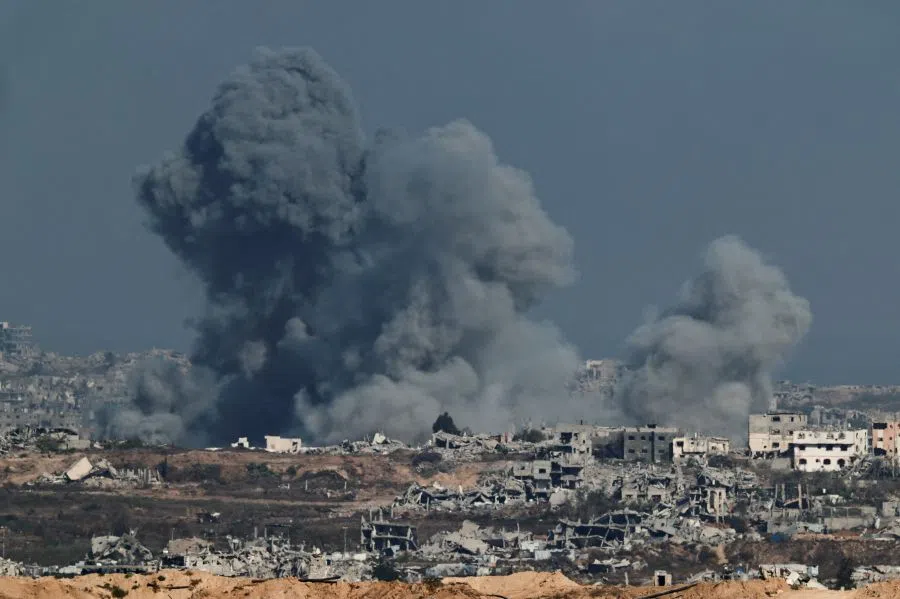 Smoke rises in Gaza after an explosion, as seen from the Israeli side of the Israel-Gaza border, on 7July 2025. (Amir Cohen/Reuters)