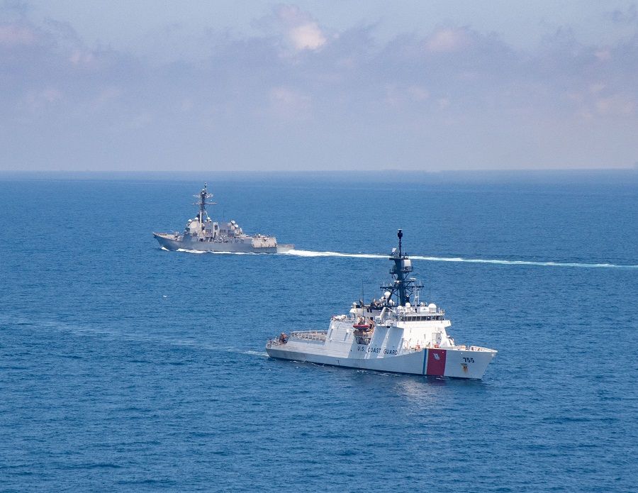 The Arleigh Burke-class guided-missile destroyer USS Kidd and US Coast Guard cutter Munro conduct Taiwan Strait transits, 27 August 2021. (US Navy/Handout via Reuters)