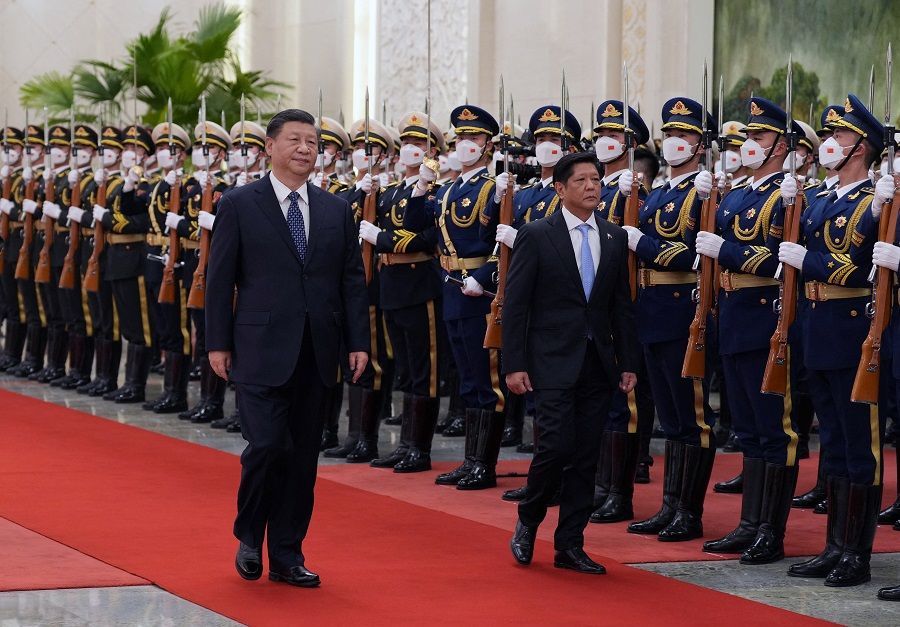 Chinese President Xi Jinping and Philippine President Ferdinand Marcos Jr. review the honour guard during a welcome ceremony at the Great Hall of the People in Beijing, China, 4 January 2023. (CNS photo via Reuters)