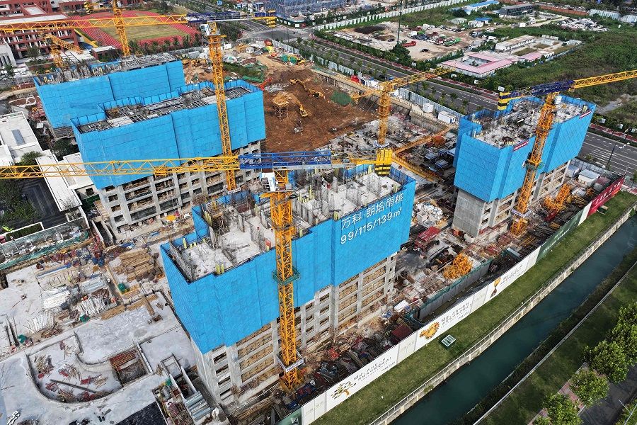 This aerial photo taken on 9 October 2023 shows residential buildings under construction by Chinese real estate developer Vanke in Nanjing, Jiangsu province, China. (AFP)