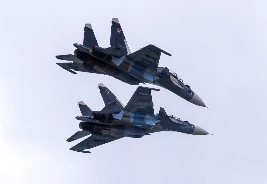 Sukhoi Su-30 jet fighters perform during the MAKS 2021 air show in Zhukovsky, outside Moscow, Russia, 24 July 2021. (Tatyana Makeyeva/Reuters)