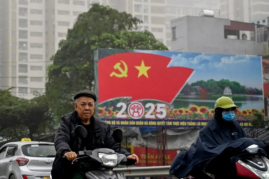 Commuters ride scooters in Hanoi, Vietnam, on 5 March 2025.