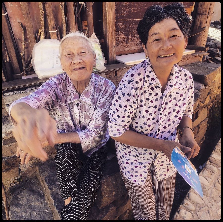 Two charming local villagers delighted to pose for my camera and share their good nature and humour.