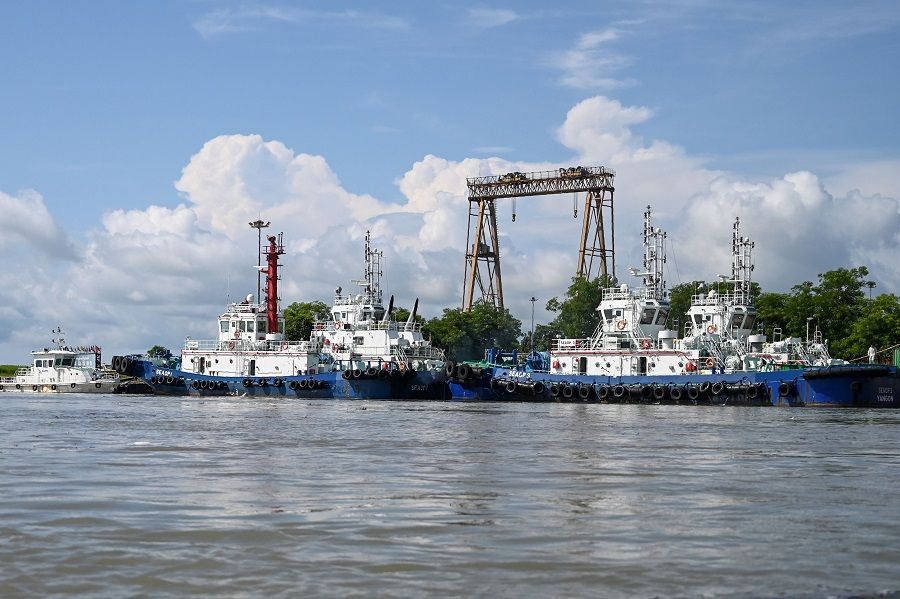 In this file photo taken on 2 October 2019, vessels are docked at a port of a Chinese-owned oil refinery plant on Made Island off Kyaukpyu, Rakhine State. (Ye Aung Thu/FP)