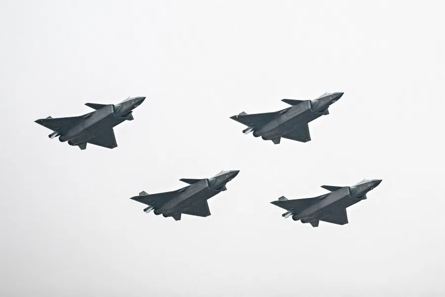 Chinese J-20 stealth fighters of the People's Liberation Army (PLA) perform at the Airshow China 2022 in Zhuhai in southern China's Guangdong province on 8 November 2022. (CNS/AFP)