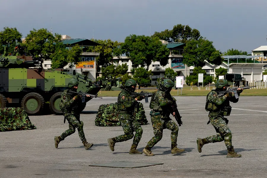 Soldiers practise during the annual military drill ahead of Lunar New year in Chiayi, Taiwan, 6 January 2023. (Ann Wang/Reuters)