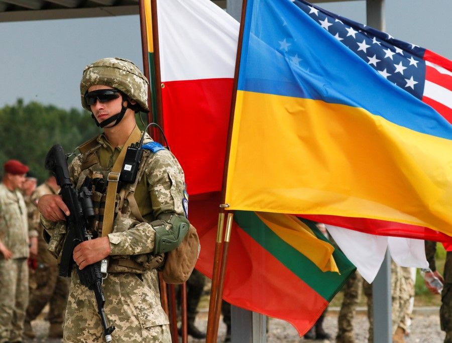 A serviceman from Ukraine attends a large military exercise called "Three Swords-2021" involving more than 1,200 servicemen and more than 200 combat vehicles from Ukraine, the US, Poland and Lithuania at Yavoriv training ground in Lviv region, Ukraine, 27 July 2021. (Gleb Garanich/Reuters)
