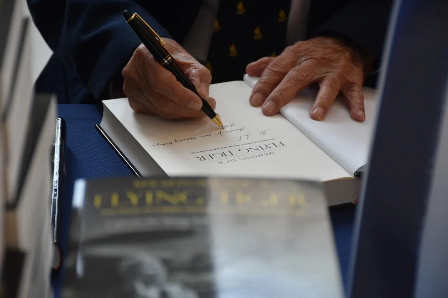 Ho at his book signing event. (World Scientific)