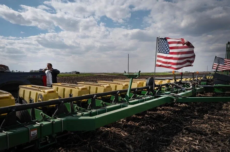 A farmer loads soybeans into his planter on 6 May 2026 near West Bend, Iowa, US. (Scott Olson/Getty Images/AFP)