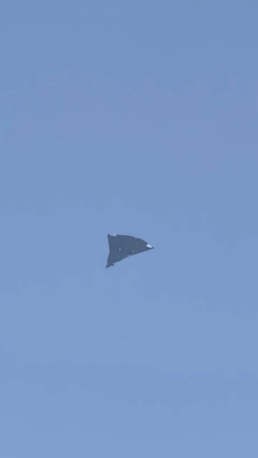 A Chinese military aircraft flies in Chengdu, Sichuan, China, in this screengrab taken from a social media video released on 26 December 2024. (Reuters)