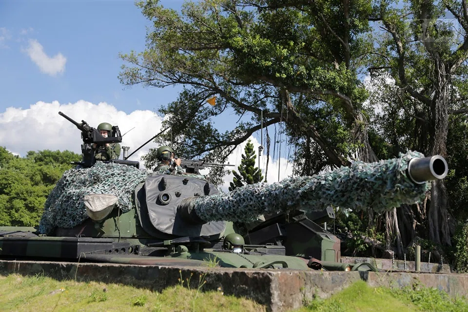 Taiwanese soldiers operate a CM-11 tank simulating firing during a military drill at an undisclosed location in Taiwan, 8 August 2022 in this handout picture released on 10 August 2022. (Taiwan Military News Agency/Handout via Reuters)