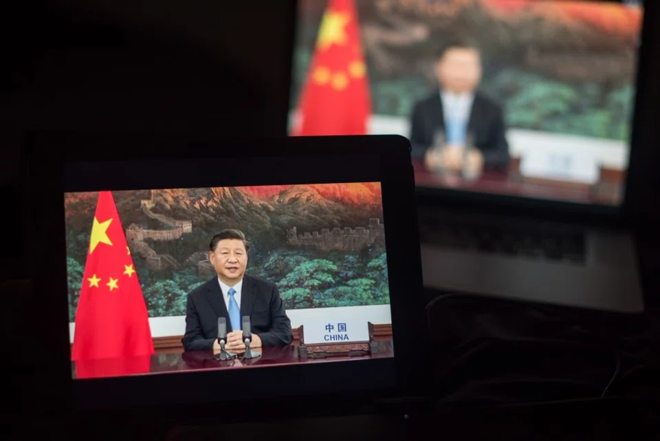 Xi Jinping, China's president, speaks during the United Nations General Assembly seen on a laptop computer in Hastings on the Hudson, New York, US, on 22 September 2020. President Xi Jinping took a veiled swipe at the U.S. in a strongly worded speech, saying no country should "be allowed to do whatever it likes and be the hegemon, bully or boss of the world." (Tiffany Hagler-Geard/Bloomberg)