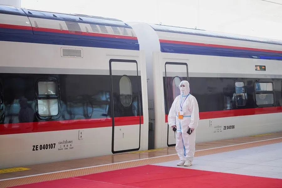 A train is ready on the station during the handover ceremony of the high-speed rail project linking the Chinese city of Kunming with Vientiane, in Vientiane, Laos, 3 December 2021. (Phoonsab Thevongsa/Reuters)