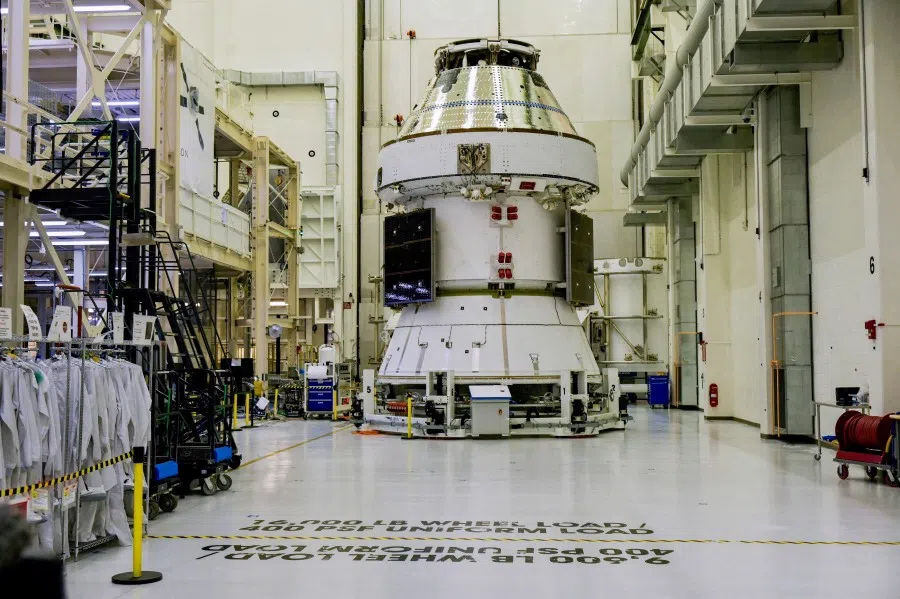 The Artemis II Orion crew and service modules sit inside the Operations & Checkoput Building during a NASA media day event at the Kennedy Space Center in Cape Canaveral, Florida, US, on 7 March 2025. (Steve Nesius/Reuters)