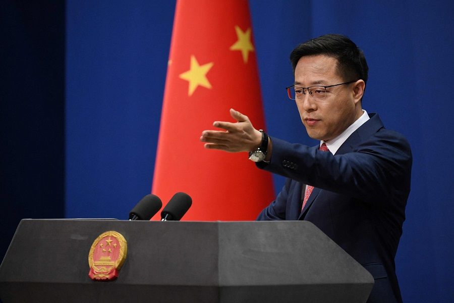 This file photo taken on 8 April 2020 shows Chinese Foreign Ministry spokesman Zhao Lijian taking a question at the daily media briefing in Beijing. (Greg Baker/AFP)