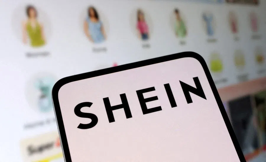 Shein logo and their web shop are seen in this illustration taken on 16 May 2024. (Dado Ruvic/Reuters)