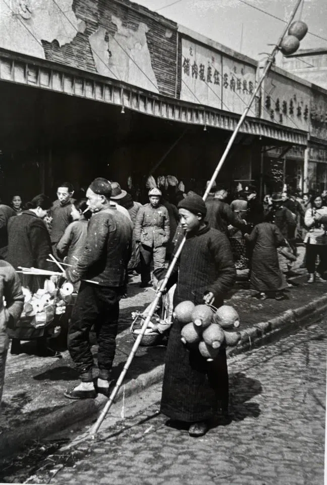 A vendor selling lanterns.