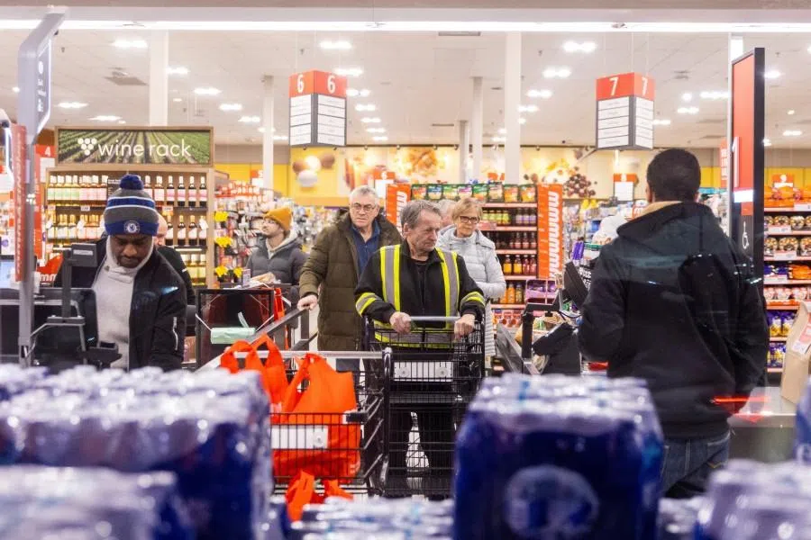 People shop in a grocery store in Mississauga, Ontario, Canada, on 26 January 2026. (Carlos Osorio/Reuters)