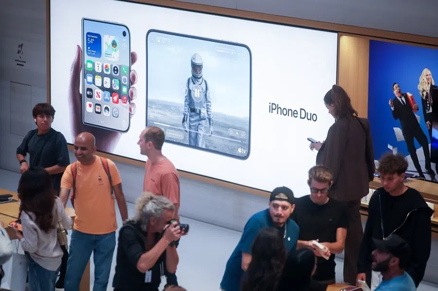 Apple iPhone Duo smartphone signage during the first day of in-store sales of Apple's latest products at Apple's Fifth Avenue store in New York, US, on 18 September 2026.