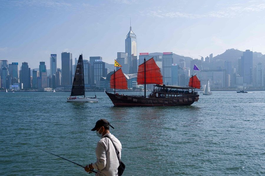 For mainland youth, the world could be their oyster in Hong Kong​. Scene at a promenade next to Victoria Harbour in Hong Kong, China, on 20 November 2022. (Bertha Wang/AFP)