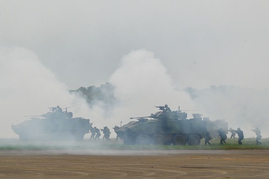 Taiwanese soldiers demonstrate their combat skills during a military open house event in Hsinchu, Taiwan, on 21 September 2023. (Sam Yeh/AFP)