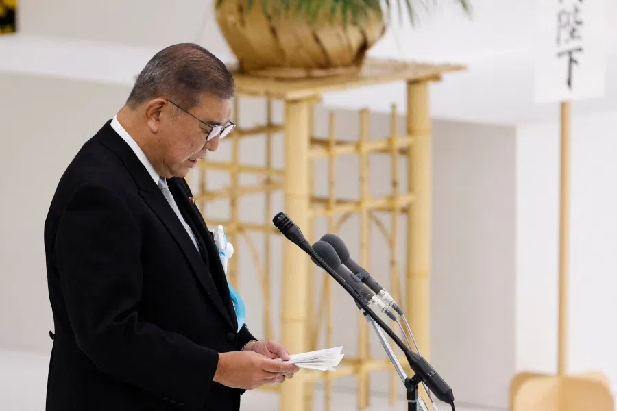 Japan’s Prime Minister Shigeru Ishiba speaks during a memorial service ceremony marking the 80th anniversary of Japan’s surrender in World War Two, at Budokan Hall, in Tokyo, Japan, 15 August 2025. (Manami Yamada/Reuters)
