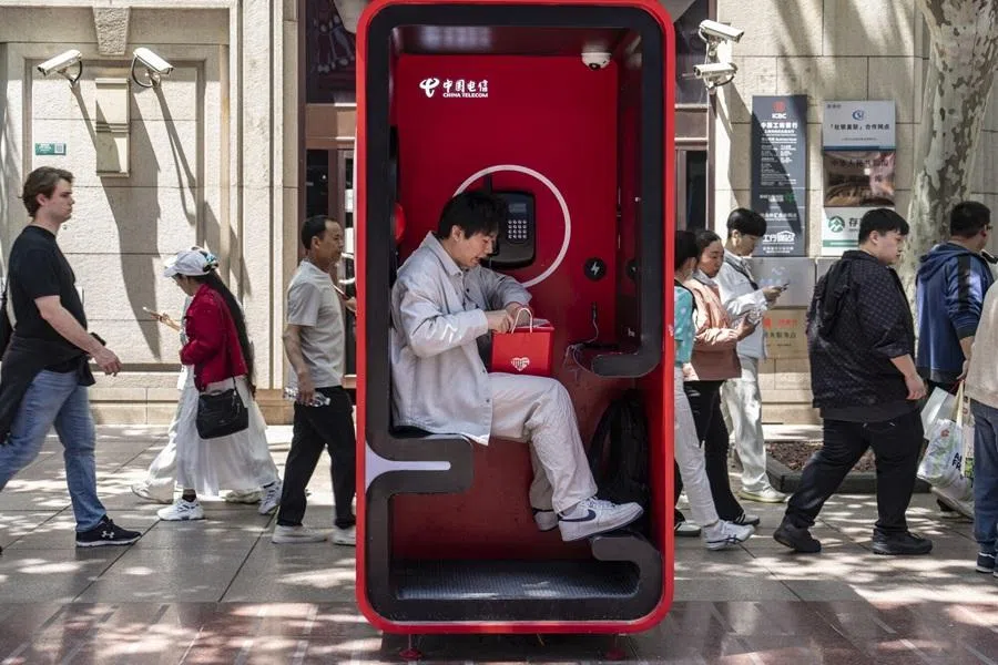 A phone booth in the Nanjing East Road retail area in Shanghai, China, 1 May 2026. (Qilai Shen/Bloomberg)
