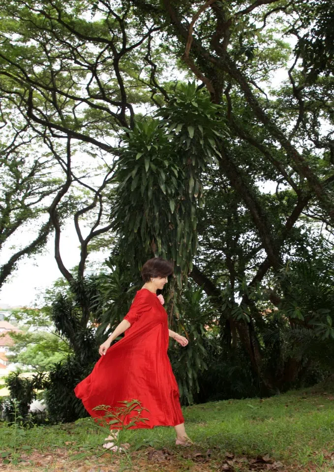 A photo of me taking a stroll in the forest. (Photographer: Xu Fugang)