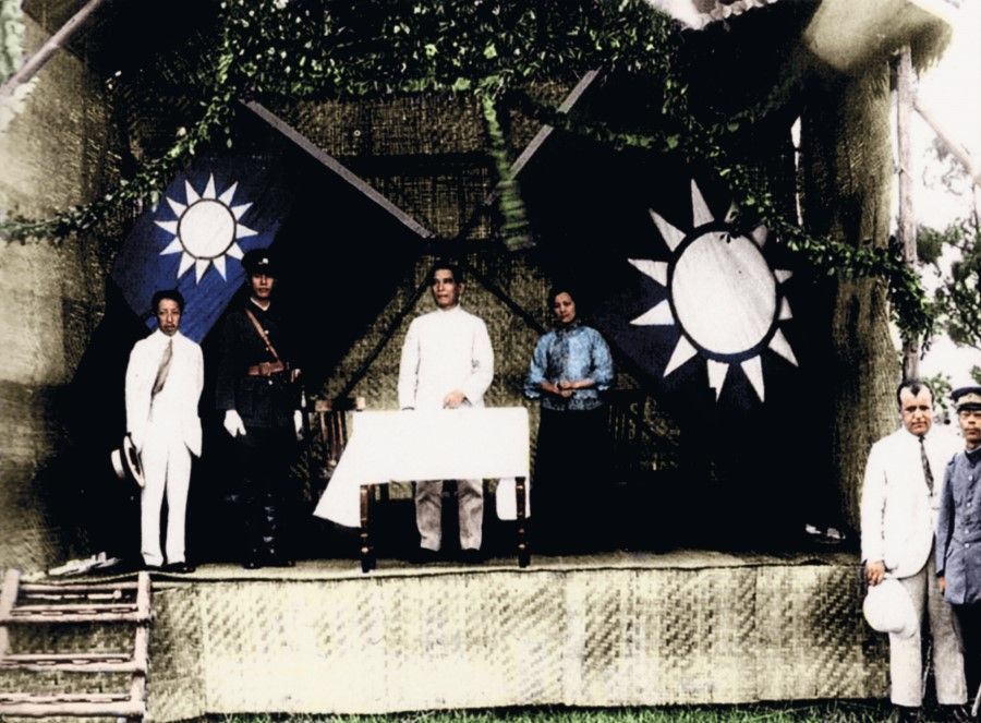 Sun Yat-sen speaking at the opening of the Whampoa Military Academy, 16 June 1924. On the right is Soong Ching-ling, and on the left is superintendent Chiang Kai-shek.