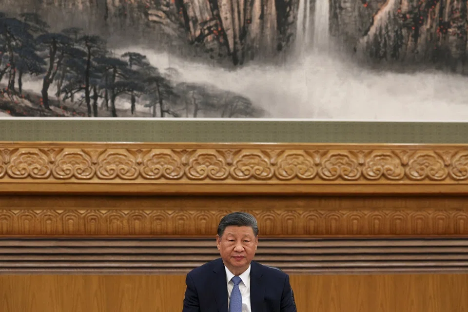 Chinese President Xi Jinping attends a meeting with foreign business leaders at the Great Hall of the People in Beijing, China, on 28 March 2025. (Florence Lo/Reuters)