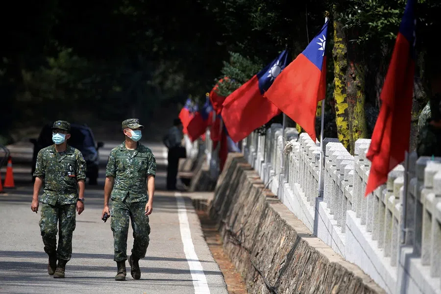 Soldiers wearing face masks are seen at an event to mark the 62nd anniversary of the Second Taiwan Strait crisis in Kinmen, Taiwan, on 23 August 2020. (Ann Wang/Reuters)
