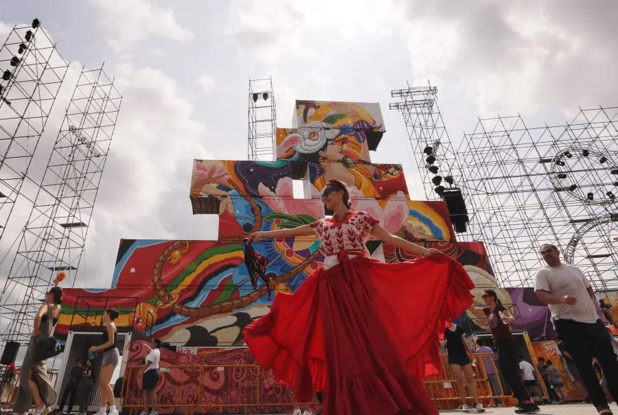 A performer practicing for the Chingay Parade 2023, a multicultural event involving the Chinese other ethnic groups in Singapore, in December 2022.